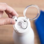 AH-M-HUSOD-Bottle with Bluetooth Earbuds